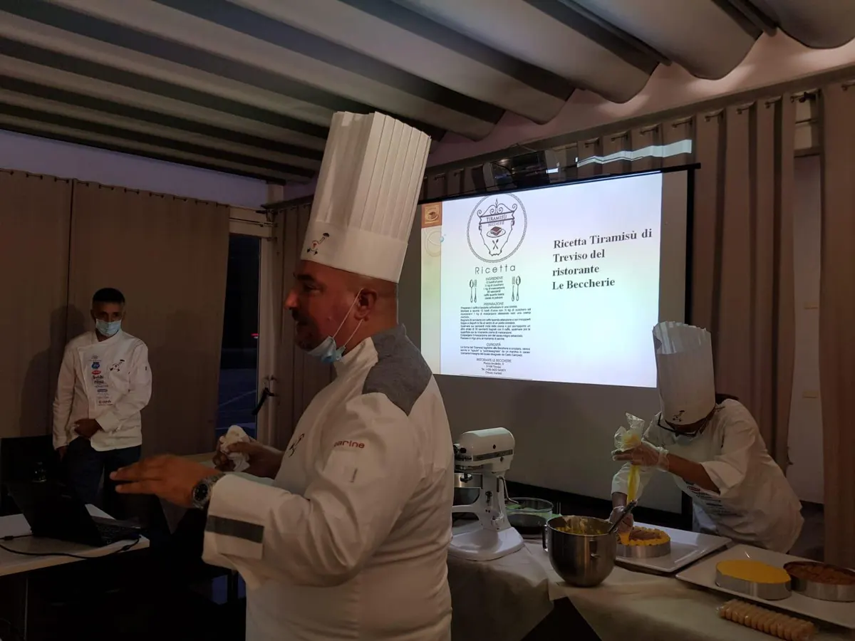 Teacher Alcide Candiotto presents the original recipe of the Tiramisù of Treviso, while Francesca