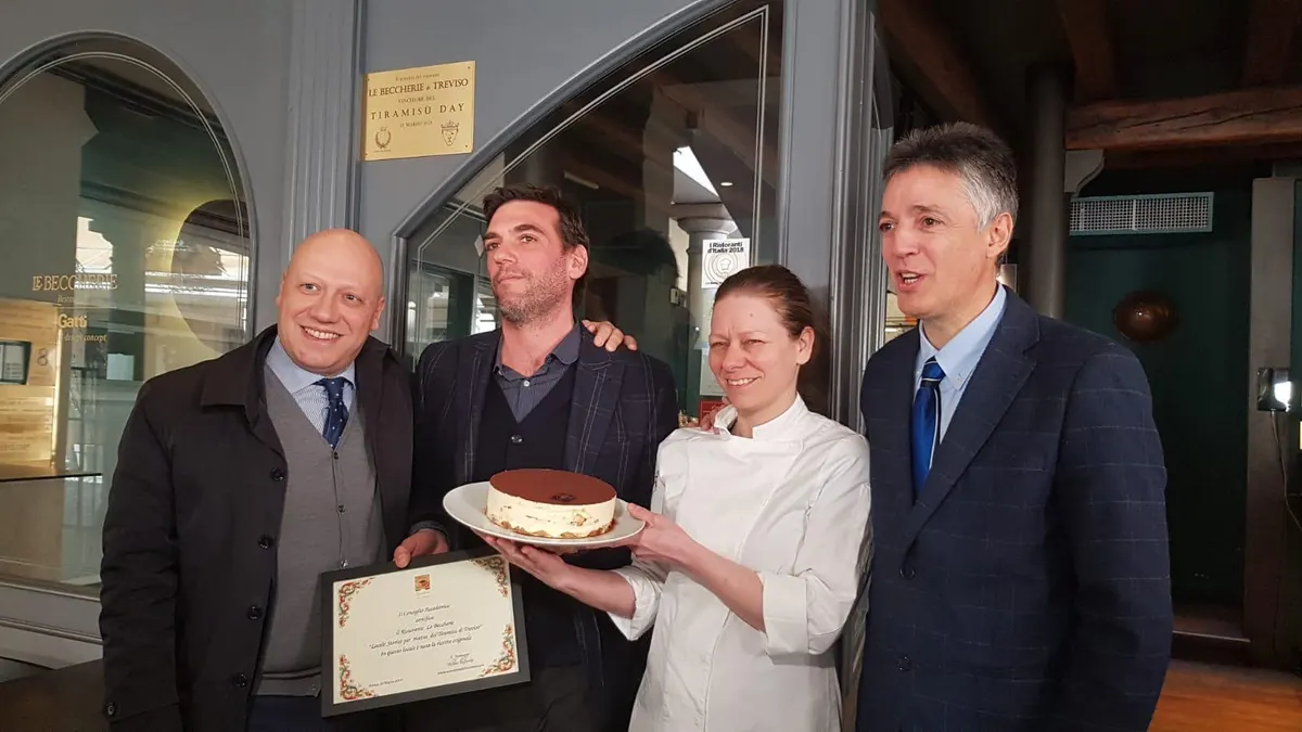 The Tiramisù of Le Beccherie with the historic venue certificate