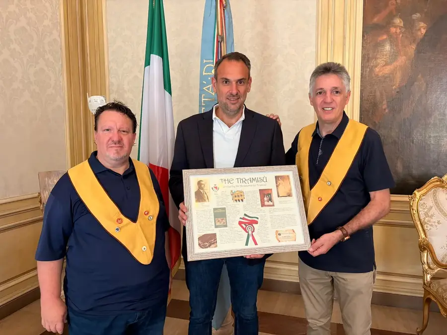 June 2026: presenting the Mayor of Treviso, Mario Conte, with the scroll bearing the history of