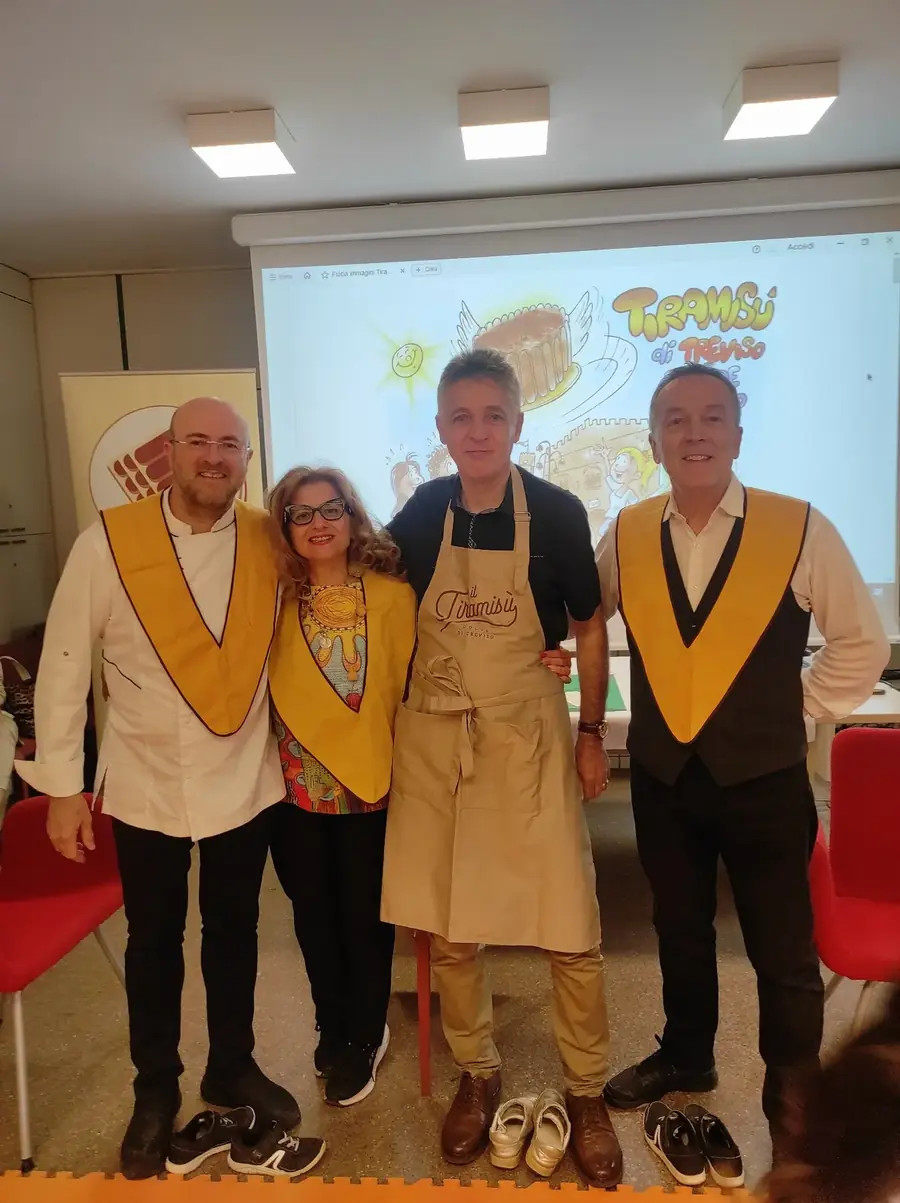Reading the Tiramisù fairy-tale book at the BRAT library for the children of Treviso
